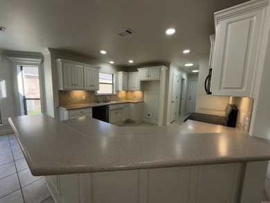 Updated one level 4 bed 2 bath on the golf course! 3 car garage on The Country Club of Arkansas in Arkansas - for sale on GolfHomes.com, golf home, golf lot