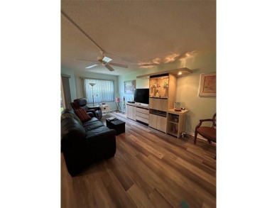 1st floor unit.  Larger one bedroom.  Luxury Vinyl plank on Flamingo Lakes Country Club in Florida - for sale on GolfHomes.com, golf home, golf lot