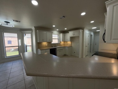 Updated one level 4 bed 2 bath on the golf course! 3 car garage on The Country Club of Arkansas in Arkansas - for sale on GolfHomes.com, golf home, golf lot