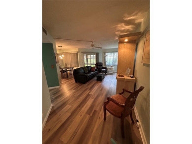 1st floor unit.  Larger one bedroom.  Luxury Vinyl plank on Flamingo Lakes Country Club in Florida - for sale on GolfHomes.com, golf home, golf lot