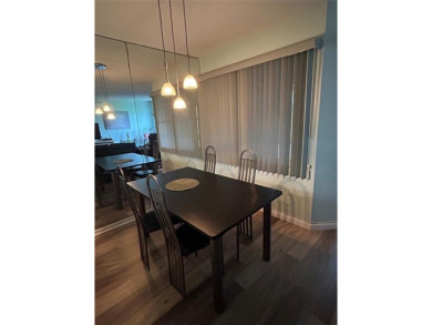 1st floor unit.  Larger one bedroom.  Luxury Vinyl plank on Flamingo Lakes Country Club in Florida - for sale on GolfHomes.com, golf home, golf lot