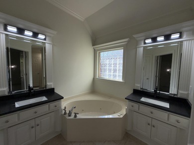 Updated one level 4 bed 2 bath on the golf course! 3 car garage on The Country Club of Arkansas in Arkansas - for sale on GolfHomes.com, golf home, golf lot