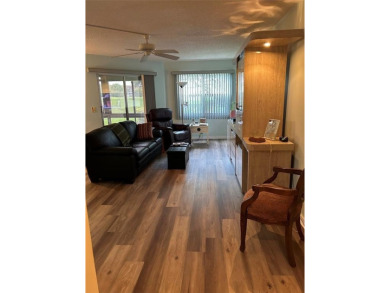 1st floor unit.  Larger one bedroom.  Luxury Vinyl plank on Flamingo Lakes Country Club in Florida - for sale on GolfHomes.com, golf home, golf lot