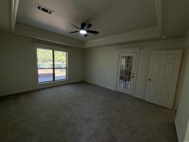 Updated one level 4 bed 2 bath on the golf course! 3 car garage on The Country Club of Arkansas in Arkansas - for sale on GolfHomes.com, golf home, golf lot