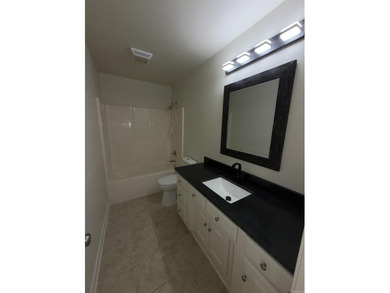 Updated one level 4 bed 2 bath on the golf course! 3 car garage on The Country Club of Arkansas in Arkansas - for sale on GolfHomes.com, golf home, golf lot