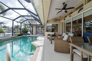 CUSTOM WATERFRONT HOME IN BSI ON KEY LOT W/**NEW METAL TILE on Twin Isles Country Club in Florida - for sale on GolfHomes.com, golf home, golf lot