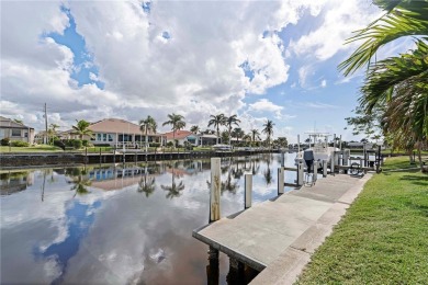 CUSTOM WATERFRONT HOME IN BSI ON KEY LOT W/**NEW METAL TILE on Twin Isles Country Club in Florida - for sale on GolfHomes.com, golf home, golf lot