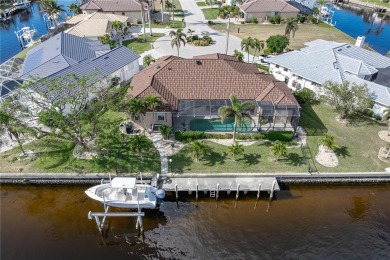 CUSTOM WATERFRONT HOME IN BSI ON KEY LOT W/**NEW METAL TILE on Twin Isles Country Club in Florida - for sale on GolfHomes.com, golf home, golf lot