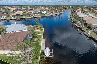 CUSTOM WATERFRONT HOME IN BSI ON KEY LOT W/**NEW METAL TILE on Twin Isles Country Club in Florida - for sale on GolfHomes.com, golf home, golf lot