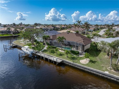 CUSTOM WATERFRONT HOME IN BSI ON KEY LOT W/**NEW METAL TILE on Twin Isles Country Club in Florida - for sale on GolfHomes.com, golf home, golf lot