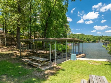 Cute open floorplan cottage on Lake Catherine in Diamondhead on Diamondhead Golf and Country Club in Arkansas - for sale on GolfHomes.com, golf home, golf lot