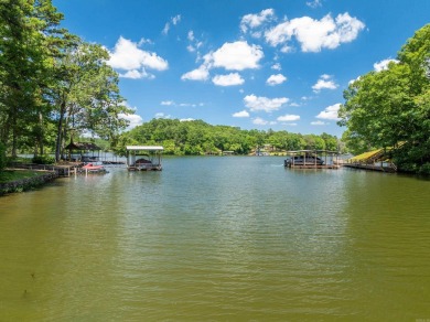 Cute open floorplan cottage on Lake Catherine in Diamondhead on Diamondhead Golf and Country Club in Arkansas - for sale on GolfHomes.com, golf home, golf lot