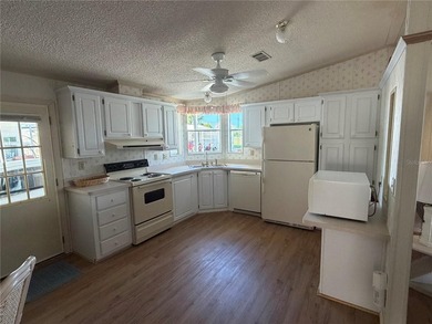 2 bedroom 2 bath manufactured home in the 55+ community of on Blue Heron Pines Golf Course in Florida - for sale on GolfHomes.com, golf home, golf lot