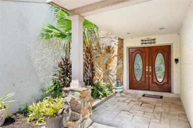 Impressive Carrollwood Village home in a beautiful a on Emerald Greens Golf Resort and Country Club in Florida - for sale on GolfHomes.com, golf home, golf lot