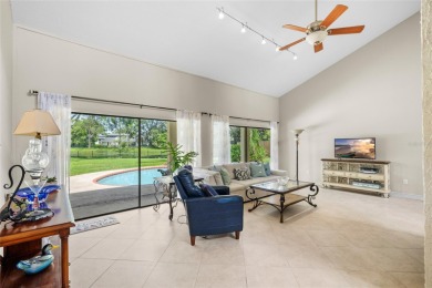 Impressive Carrollwood Village home in a beautiful a on Emerald Greens Golf Resort and Country Club in Florida - for sale on GolfHomes.com, golf home, golf lot