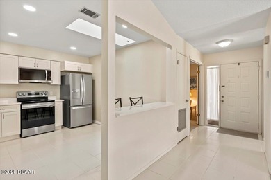 Effortless living in a beautifully maintained single-story on The Club At Pelican Bay - North Course in Florida - for sale on GolfHomes.com, golf home, golf lot