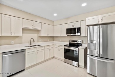 Effortless living in a beautifully maintained single-story on The Club At Pelican Bay - North Course in Florida - for sale on GolfHomes.com, golf home, golf lot