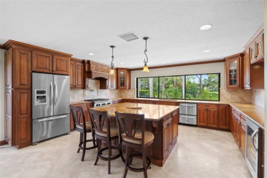 Impressive Carrollwood Village home in a beautiful a on Emerald Greens Golf Resort and Country Club in Florida - for sale on GolfHomes.com, golf home, golf lot