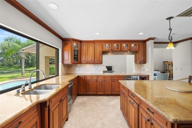 Impressive Carrollwood Village home in a beautiful a on Emerald Greens Golf Resort and Country Club in Florida - for sale on GolfHomes.com, golf home, golf lot