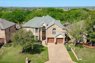 Nestled within the Resort on Eagle Mountain Lake, situated on on The Golf Club at Resort Eagle Mountain Lake in Texas - for sale on GolfHomes.com, golf home, golf lot