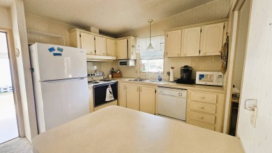 Welcome to your cozy retreat in the sought-after Golf Course on Blue Heron Pines Golf Course in Florida - for sale on GolfHomes.com, golf home, golf lot
