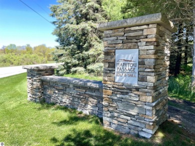 Surround yourself among nature and endless recreation on Manitou Passage Golf Club in Michigan - for sale on GolfHomes.com, golf home, golf lot