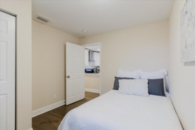 Welcome to this spacious and updated home in Northeast St on Mangrove Bay Golf Course in Florida - for sale on GolfHomes.com, golf home, golf lot