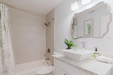 Welcome to this spacious and updated home in Northeast St on Mangrove Bay Golf Course in Florida - for sale on GolfHomes.com, golf home, golf lot