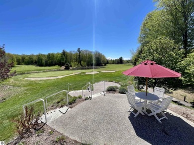 Surround yourself among nature and endless recreation on Manitou Passage Golf Club in Michigan - for sale on GolfHomes.com, golf home, golf lot