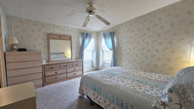 Welcome to your cozy retreat in the sought-after Golf Course on Blue Heron Pines Golf Course in Florida - for sale on GolfHomes.com, golf home, golf lot