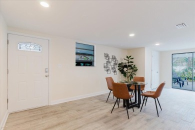 Welcome to this spacious and updated home in Northeast St on Mangrove Bay Golf Course in Florida - for sale on GolfHomes.com, golf home, golf lot