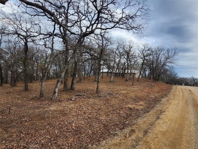 Beautiful build site in Nocona Hills, right down the street to on Nocona Hills Golf Course in Texas - for sale on GolfHomes.com, golf home, golf lot