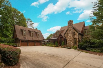 A world of private beauty awaits as you enter past the grand on Achasta Golf Club in Georgia - for sale on GolfHomes.com, golf home, golf lot