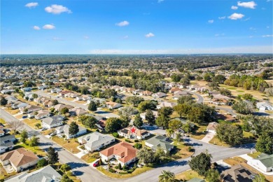 2/2 PLUS OFFICE , SOLAR PANELS. Furnished. Palm model in the on Eagle Ridge At Spruce Creek Country Club in Florida - for sale on GolfHomes.com, golf home, golf lot