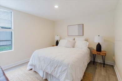 Welcome to this spacious and updated home in Northeast St on Mangrove Bay Golf Course in Florida - for sale on GolfHomes.com, golf home, golf lot