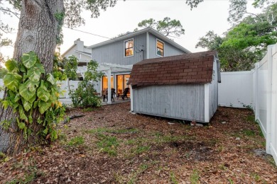 Welcome to this spacious and updated home in Northeast St on Mangrove Bay Golf Course in Florida - for sale on GolfHomes.com, golf home, golf lot