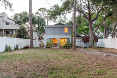 Welcome to this spacious and updated home in Northeast St on Mangrove Bay Golf Course in Florida - for sale on GolfHomes.com, golf home, golf lot