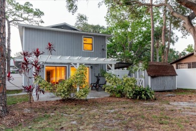 Welcome to this spacious and updated home in Northeast St on Mangrove Bay Golf Course in Florida - for sale on GolfHomes.com, golf home, golf lot