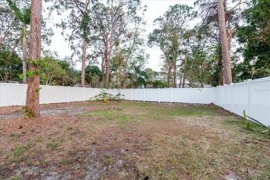 Welcome to this spacious and updated home in Northeast St on Mangrove Bay Golf Course in Florida - for sale on GolfHomes.com, golf home, golf lot