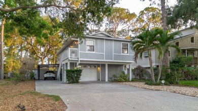 Welcome to this spacious and updated home in Northeast St on Mangrove Bay Golf Course in Florida - for sale on GolfHomes.com, golf home, golf lot