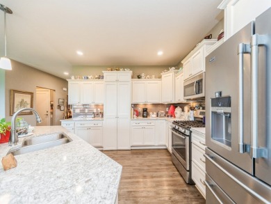This stunning stand-alone Villa at Briarwood Heights backs to on Briarwood Club of Ankeny in Iowa - for sale on GolfHomes.com, golf home, golf lot