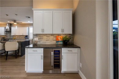 Step into modern luxury with this completely renovated Osprey on Herons Glen Golf and Country Club in Florida - for sale on GolfHomes.com, golf home, golf lot