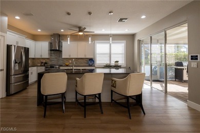 Step into modern luxury with this completely renovated Osprey on Herons Glen Golf and Country Club in Florida - for sale on GolfHomes.com, golf home, golf lot