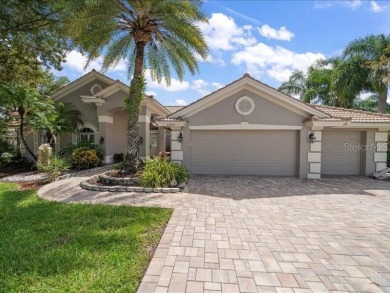 Under contract-accepting backup offers. Gated Community in on East Lake Woodlands Country Club in Florida - for sale on GolfHomes.com, golf home, golf lot