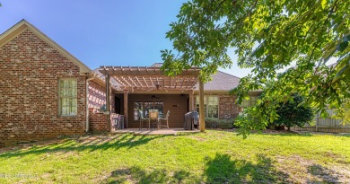 This spacious 4 bedroom, 3 bathroom home is situated in the on Lake Caroline Golf Club in Mississippi - for sale on GolfHomes.com, golf home, golf lot