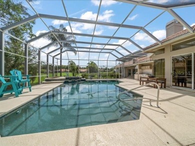 Under contract-accepting backup offers. Gated Community in on East Lake Woodlands Country Club in Florida - for sale on GolfHomes.com, golf home, golf lot