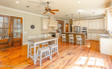 This spacious 4 bedroom, 3 bathroom home is situated in the on Lake Caroline Golf Club in Mississippi - for sale on GolfHomes.com, golf home, golf lot