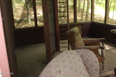 Tucked away in the amenity-rich, gated community of The Hideout on The Hideout Golf in Pennsylvania - for sale on GolfHomes.com, golf home, golf lot