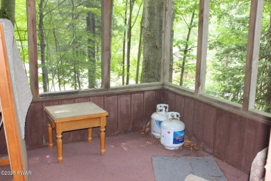 Tucked away in the amenity-rich, gated community of The Hideout on The Hideout Golf in Pennsylvania - for sale on GolfHomes.com, golf home, golf lot
