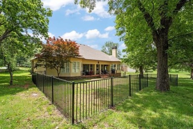 Situated on the 18th hole of the golf course in The Coves at on The Coves Golf Course in Oklahoma - for sale on GolfHomes.com, golf home, golf lot